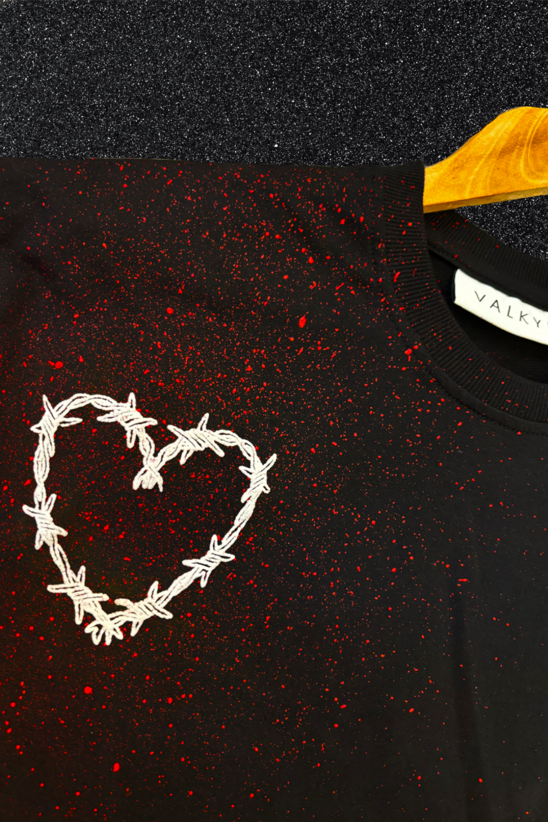 'ALL YOU NEED IS LOVE' BLACK PUFF SPLATTER TEE