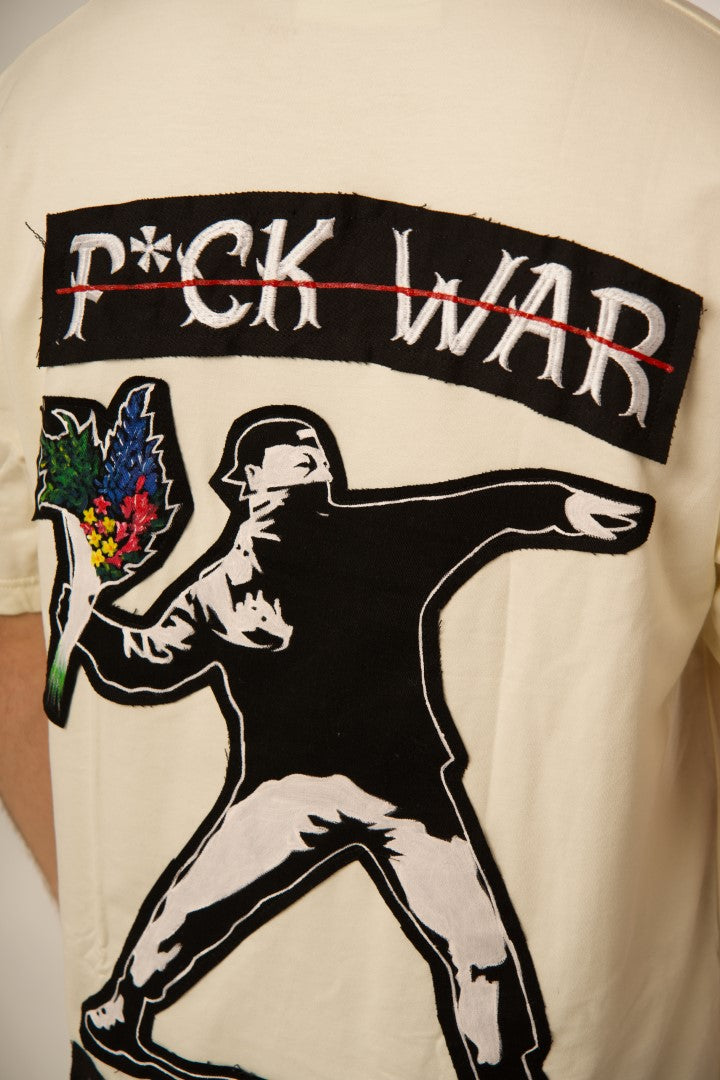 BANKSY 'F*CK WAR, MORE ART' OFF WHITE VALKYRE TSHIRT